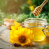 Fresh flower honey on a wooden table. Selective focus. Summer, autumn still life.